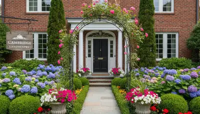 Front yard landscape design with colorful flowers and shaped shrubs enhancing curb appeal in Cambridge, MA